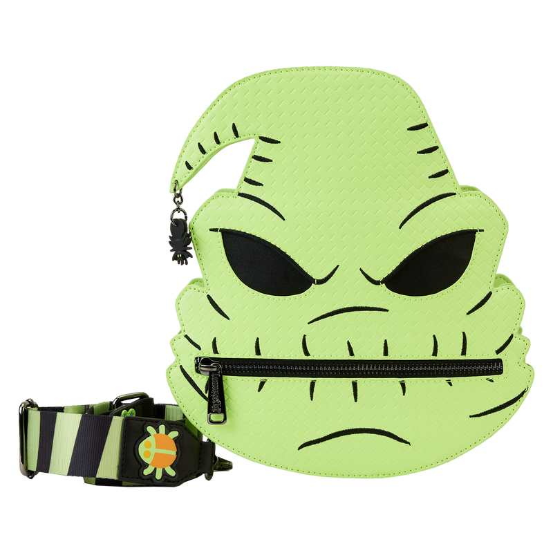 Image of crossbody bag in the shape of Oogie Boogie's head from Tim Burton's The Nightmare Before Christmas, featuring a zip pocket mouth and a spider charm on the top